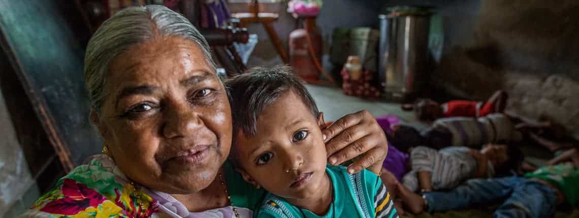 woman holding her child