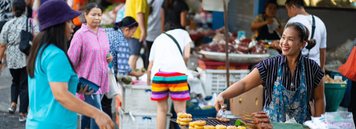 Street vendor in Bangkok greets a customer. Photo: P. Wedel