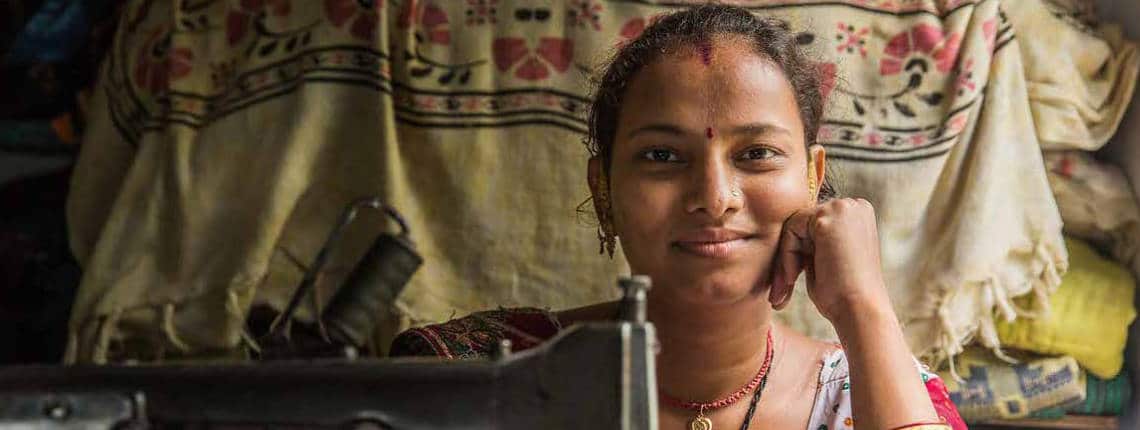 woman home worker with sewing machine