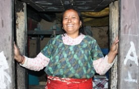 A home-based weaver in Nepal