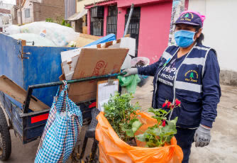 A waste picker and mother of four in Lima, Peru.