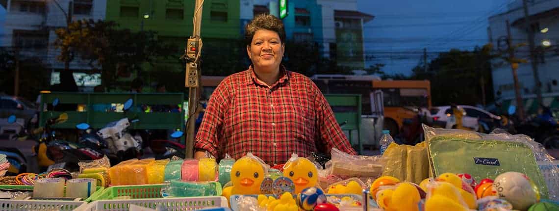 Renu at her stall in Bangkok, Thailand, before the pandemic, in 2015