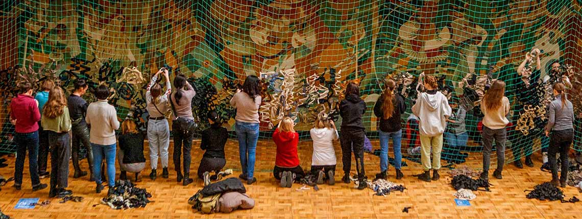 Local women make camouflage nets, Uzhhorod in western Ukraine