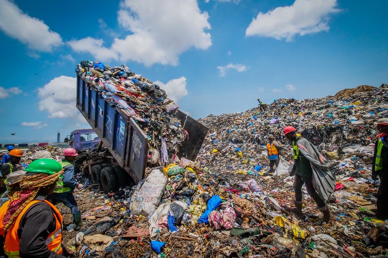 Waste pickers pick recyclable waste at a dump site in Accra, Ghana. Photo by Dean Saffron for WIEGO.