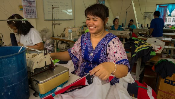 A garment worker from the Dignity Returns factory