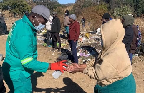 Waste pickers group ARO drop off - hand santiizing