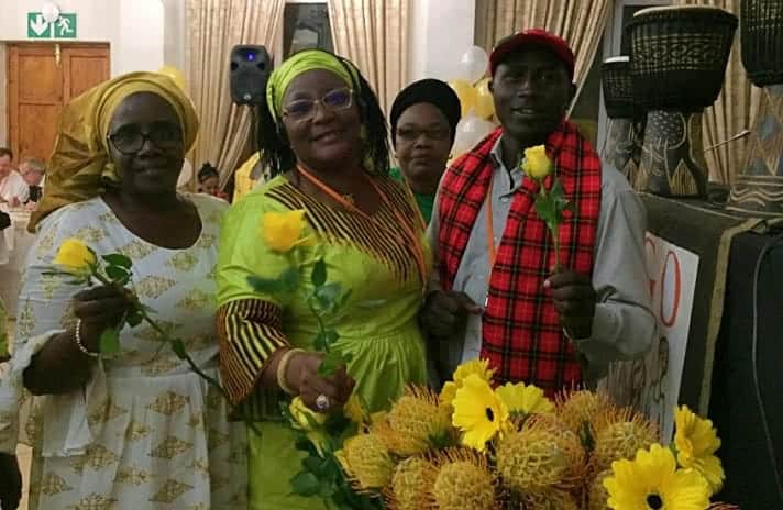 people holding flowers