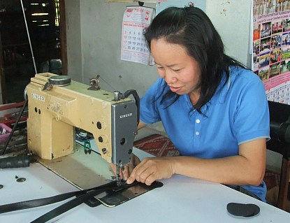 home-based worker sewing