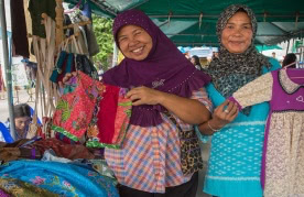 Home-based workers sell their products on the market. 