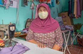 A home-based worker in Bangkok, Thailand, during the COVID-19 pandemic