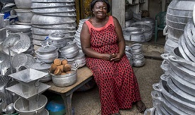 Mary Osei sells pots at Makola Market