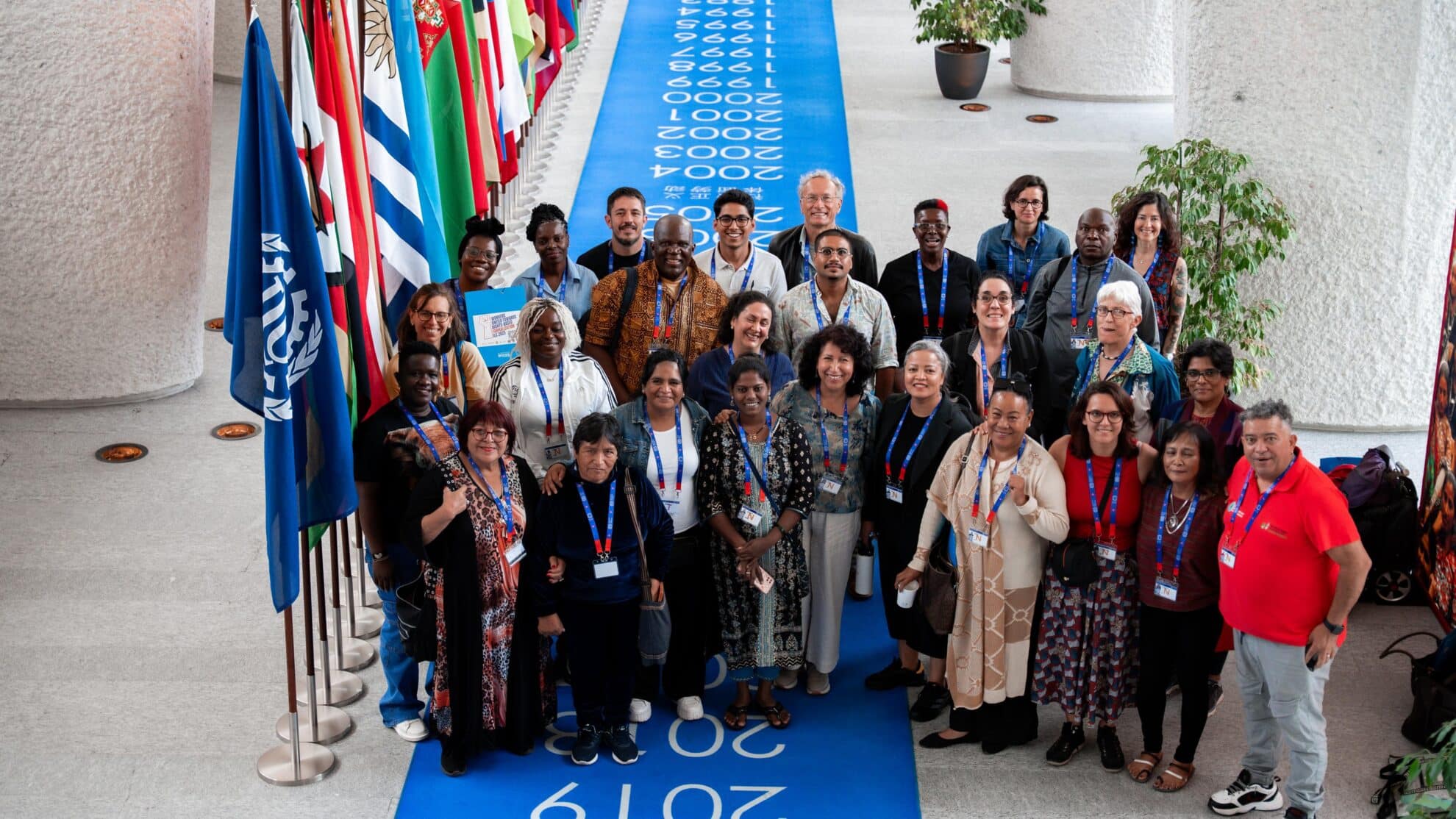 A global delegation of technical experts and worker representatives from WIEGO and global networks of workers in informal employment attend the 2025 International Labour Conference